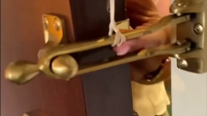 It turns out that a rubber band and tape can open the door bolt. Be careful next time!
