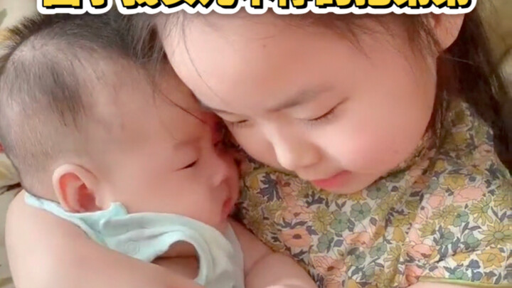 Because my daughter keeps hugging her little brother… well, he’s become like a constant shadow, clin