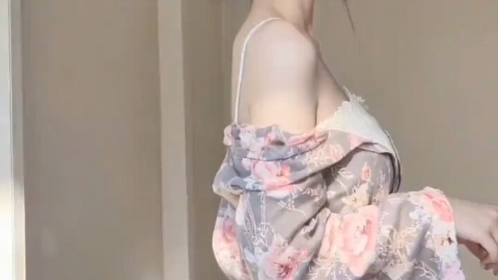 Graceful and slender, a girl of thirteen or so, like the budding magnolia at the start of February.