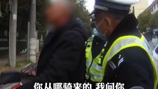 On March 2nd, in Xiangyang, Hubei, a man was stopped for driving under the influence and insisted th