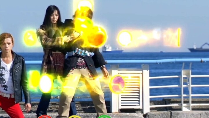 Famous scene of Kamen Rider OOO: Ankh and Bina help Eiji transform