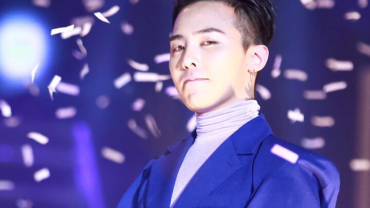 G-Dragon –– Even in-ear monitors become mere props when faced with sheer, undeniable dominance.