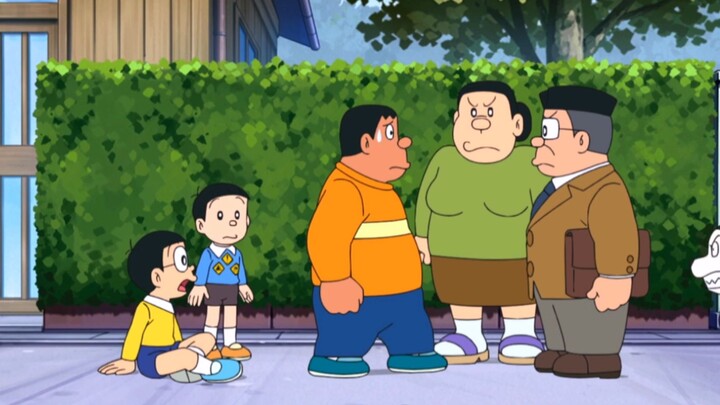 Nobita menggunakan stiker rambu lalu lintas untuk bermain dengan Fat Tiger