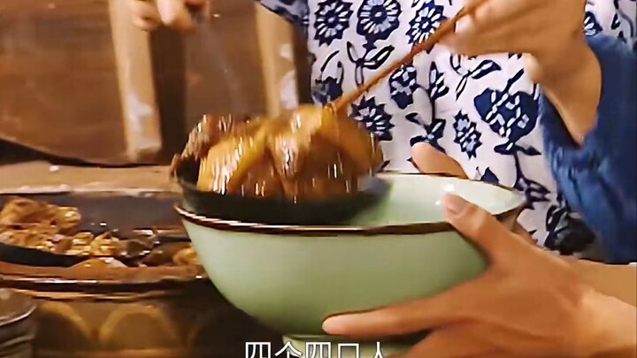Villagers enjoy hearty portions of braised pork in a communal pot—now they’ll have meat every single