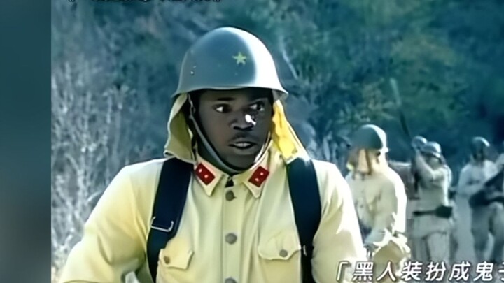 A Black man disguises himself as a Japanese devil.