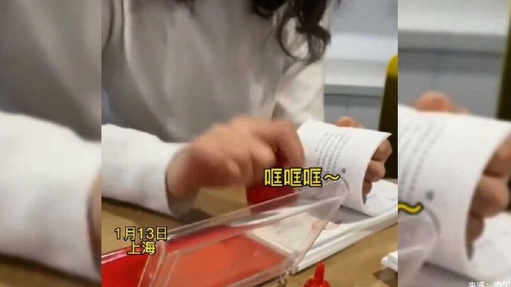 Who are these two now? Their stamping creates a rhythmic vibe, and the two employees stand in stark 