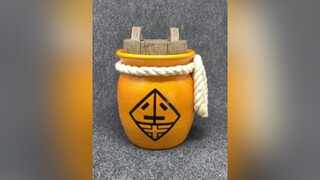 untraditional urn with an unexpected message clay ceramics pottery art clayart clayartist handmade naruto urn