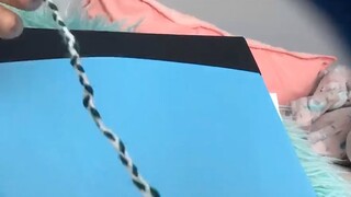 Making A Hair Tassel With Yarn MI State Colors