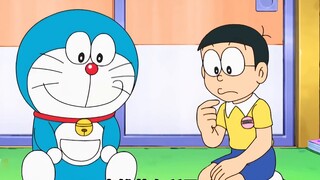 Nobita memakai lencana masa depan dan menjadi protagonis cerita, *tara Fat Tiger menjadi penjaha