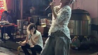 Oh my gosh, you're telling me these two homeless guys who were freely singing at a Qingdao night mar
