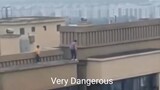 Children playing on Top of building