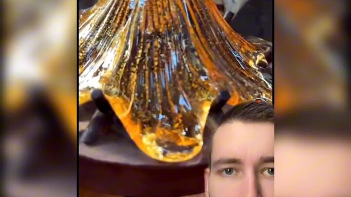 عملية صنع مصباح الزهور الزجاجي