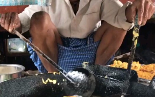 Indian street breakfast, fried flatbread, doesn't have much flavor.