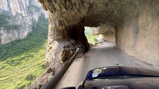Extreme U-turn on narrow road with wall