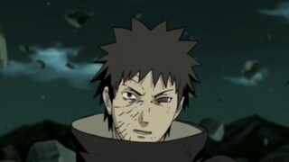 Topeng putihnya rusak, dan orang di balik topeng itu adalah Uchiha Obito