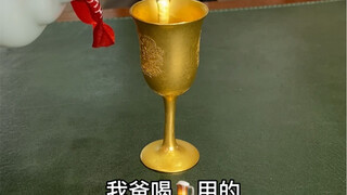 I drink, light the golden cup...