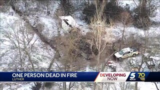 Person dead after travel trailer catches fire in Luther, officials say