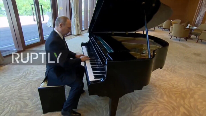 Putin Playing the Piano in Real Footage (Seems a Bit Off-Key)