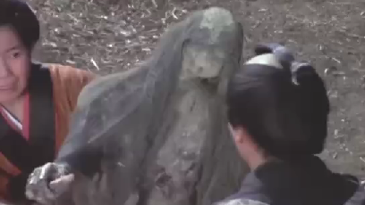 Villagers Dig Up a Living Buddha Whose Hair Grows and Who Taps a Wooden Fish