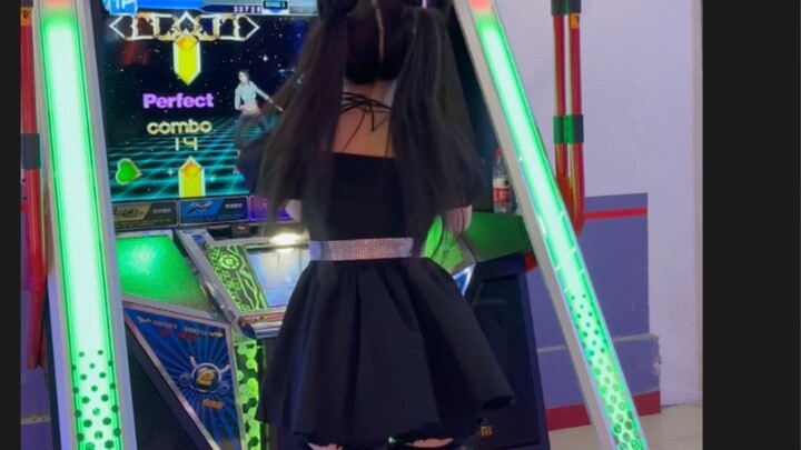 I actually saw a black stockings, twin ponytails and cat ears girl in the game city... Dance Machine