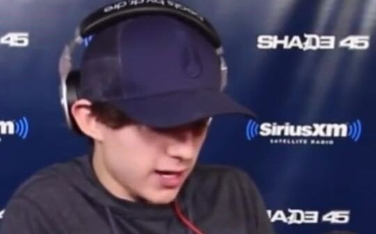 Tom Holland’s mouth seems to be on fire...