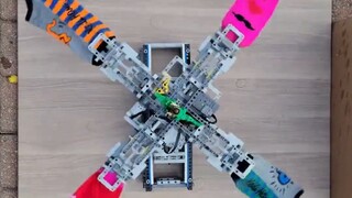 Sang master membuat mesin cuci dengan Lego dan mengatur berbagai program seperti mencuci, memutar, d