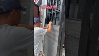 Làm cửa cổng bằng tấm ốp gỗ nhựa