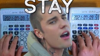 Play Stay of the Kid LAROI & Justin Bieber with calculators