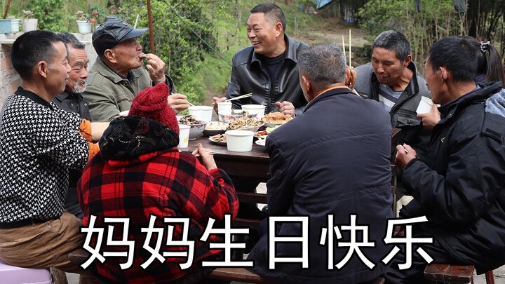 Treating the whole village to a free feast, with fine wine and hearty dishes—Happy 84th birthday, Mo