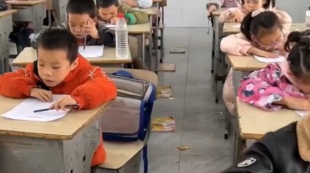 To prevent students from cheating, the teacher asked everyone to put their textbooks on the floor.