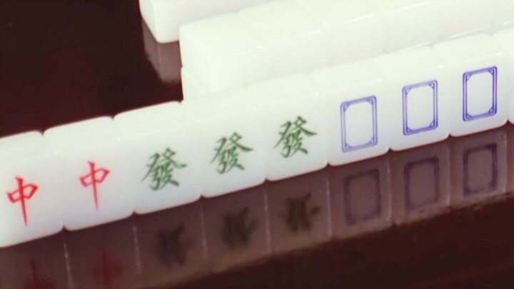 A young man outwits his opponents at mahjong, and with a single move, they end up discarding the Big