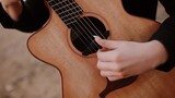 Mainkan karya piano Yiruma "River Flows in You" dengan gitar