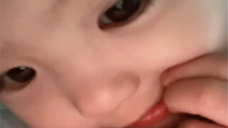 The baby sounds of a human cub after waking up