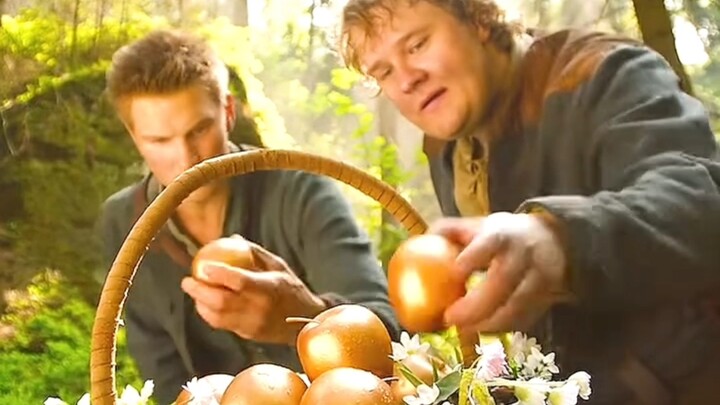 Two teenagers find a basket of golden apples in the forest. Thirsty and exhausted, they just start e