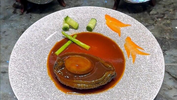 تم تحويل الكالامار الأسود الذهبي إلى تحف فنية وبلح البحر المجفف!