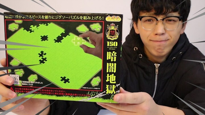 A young man challenged himself to put together a light-up puzzle in complete darkness.