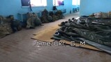 Ukrainian soldiers taking position in a school