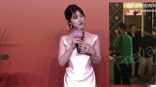WuLei listening Zhao Lusi’s red carpet interview before entering inside the venue of BVLGARI