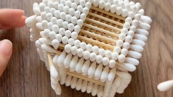 Build a small house out of a box of cotton swabs