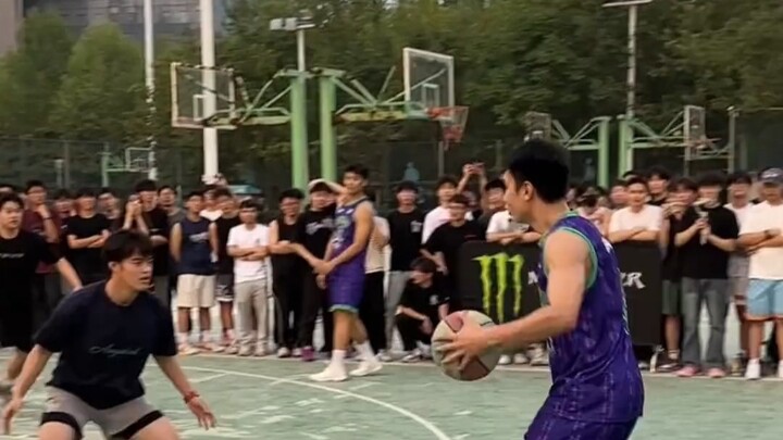 One person has the ball, nine are panicking.