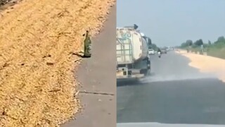 农民在马路晒庄稼还布置钉子，结果被洒水车浇湿，网友吵翻天！