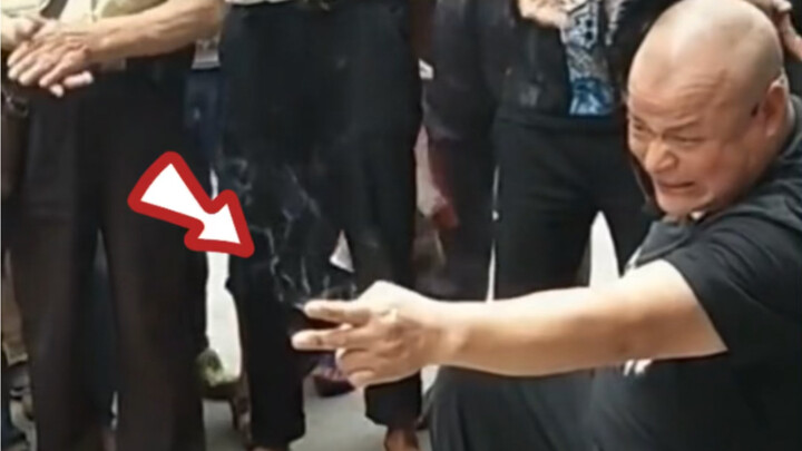 Membongkar penipuan jalanan: tenaga dalam jari mengeluarkan asap!