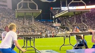 This boy wore a mascot costume at a sports game