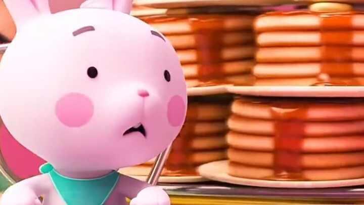 The little bunny loves eating pancakes.