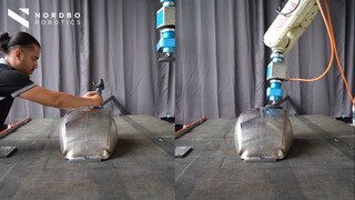 Mimic on Nachi with Suhner Tool • Nordbo Robotics