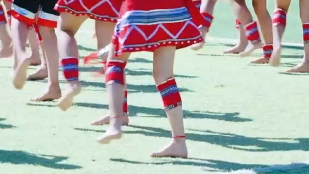 Middle School Girl Dances Ethnic Dance Barefoot on the Playground