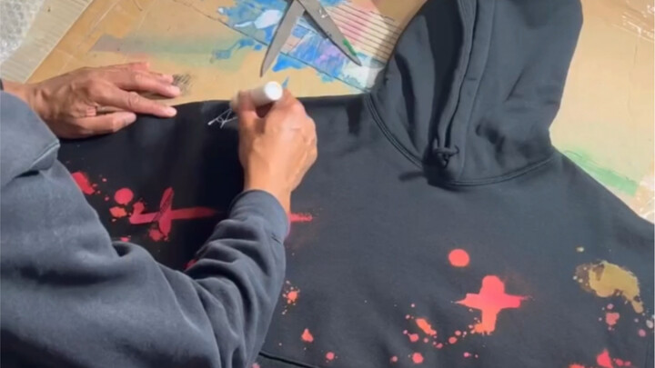 Artist Armagh has created a one-of-a-kind graffiti-painted hoodie.