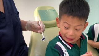 Just how horrible is it for a human baby to have their teeth checked?