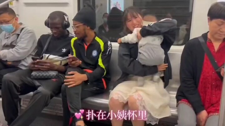 A Black man scared the little baby into tears.