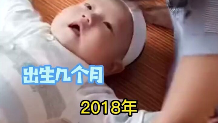The younger brother had just been born, and the older sister kissed and cuddled him every day—little